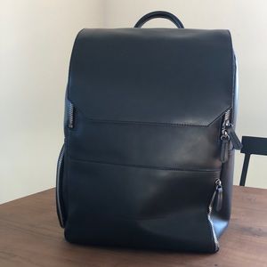 Gently-used leather Atlas Minimalist Backpack